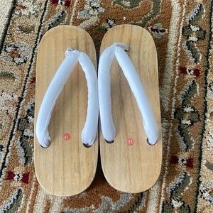 Wooden ninja/ demon slayer shoes.